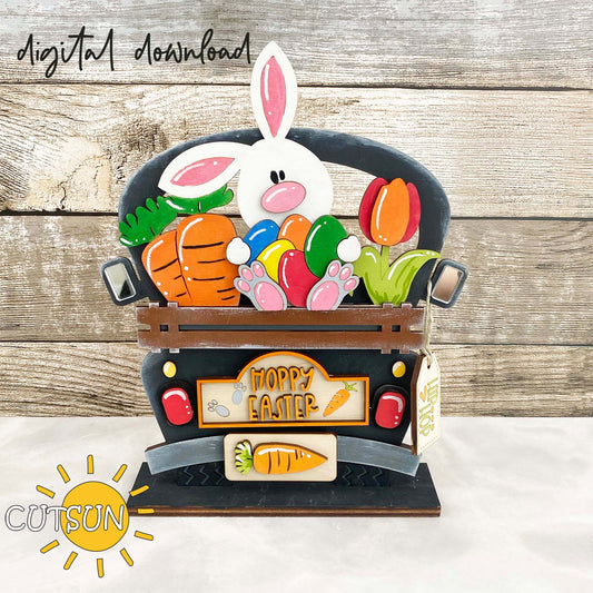 A digital illustration of a bunny with Easter eggs and carrots, designed to be cut with a laser cutter, forming part of an Easter-themed decoration.