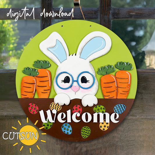 A digital image of a bunny with eyeglasses door hanger design, featuring carrots and Easter eggs with the word 'Welcome' on it, intended for laser cutting or crafting with vinyl.
