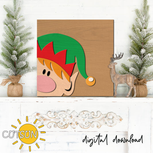 Elf Hi-Series SVG showing a peekaboo Christmas elf in red and green hat on a square sign; layered laser cut file for holiday décor.
