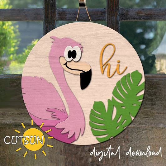 Circular wooden sign with a pink flamingo and green leaves on a wooden surface, featuring the brand 'CUTSUN'.
