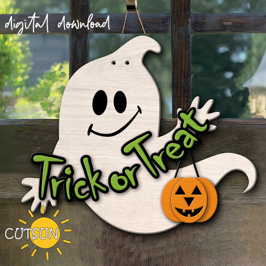 Laser cut file for a Halloween door hanger in the shape of a cute ghost holding a banner with the text "Trick or treat" and a small JackOLantern