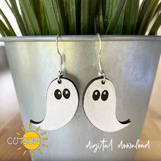 A pair of ghost-shaped earrings displayed in a plant pot, indicating a digital download for the design file.
