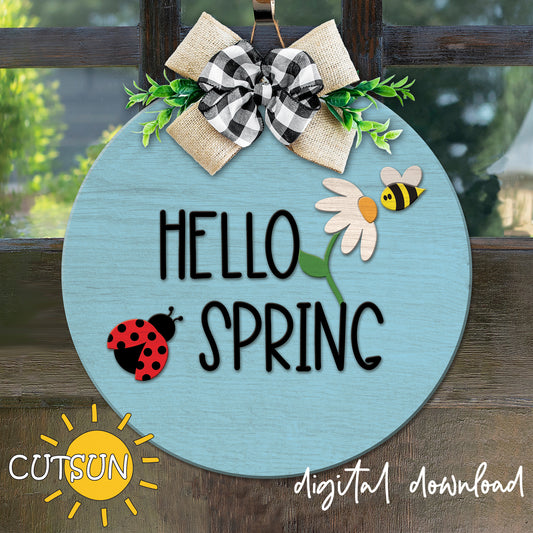 Digital download for a round door hanger featuring the text Hello Spring, a daisy, a bee and a lady bug.