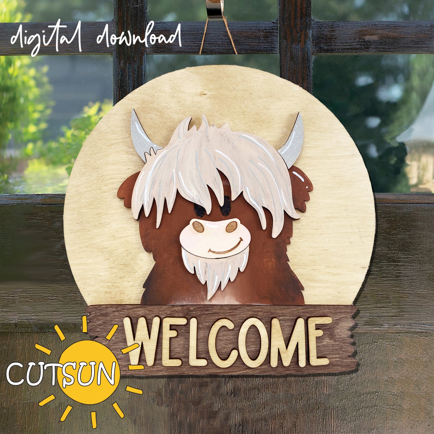 A digital image showing a round door hanger with a wooden background, featuring a cut-out silhouette of a Highland cow with horns, and the word 'Welcome' written at the bottom.