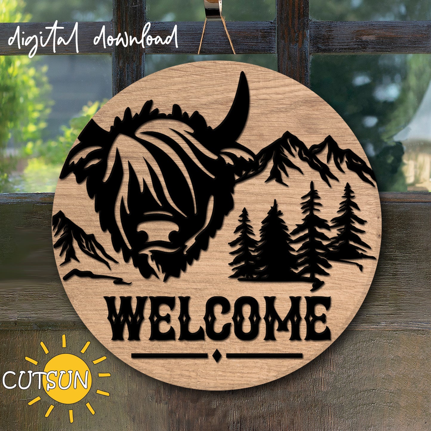 A digital download image showing a circular wooden door hanger with a laser cut design of a Highland cow and mountains, with the text 'Welcome' in a cursive font.