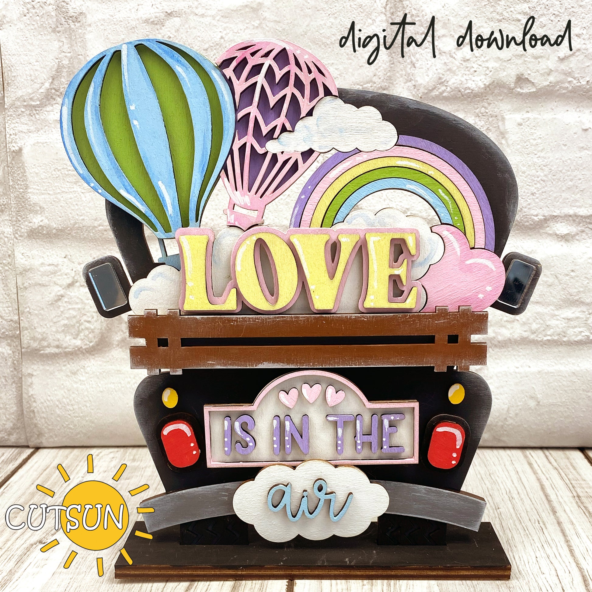 A digital rendering of a hot air balloon add-on for a truck SVG laser cut file, with the words 'LOVE IS IN THE AIR' displayed.
