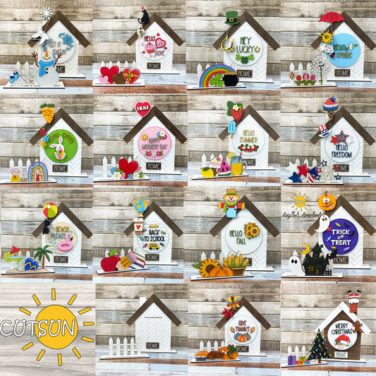 A collection of interchangeable house and fence decorations with various add-ons, each designed for laser cutting, displayed in a collage format on a wooden background.