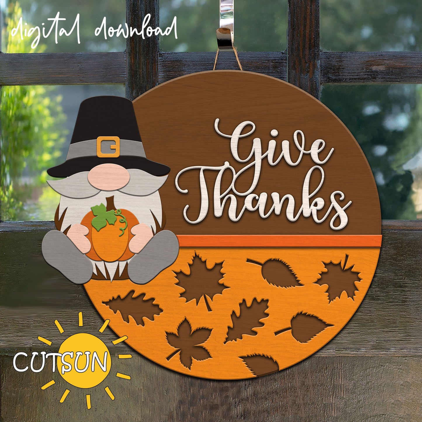 Thanksgiving door hanger SVG featuring Pilgrim Gnome holding pumpkin with “Give Thanks” text and patterned bottom section; layered laser cut file.