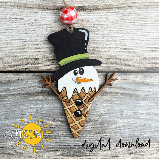 Melting snowman ice cream ornament SVG cut file with top hat, carrot nose, and waffle cone design for Christmas crafts.