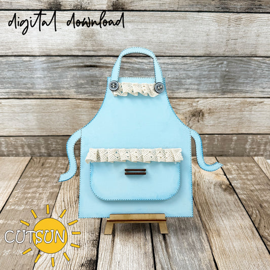 Interchangeable Apron SVG base file with optional laser-cut lace, suitable for rustic kitchen shelf sitter decor and tabletop display.