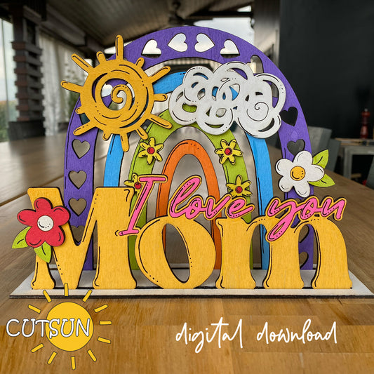 Mother's day shelf sitter featuring a colorful rainbow, doodle sun and cloud, doodle flowers and the text "I love you Mom" - digital donwload.
