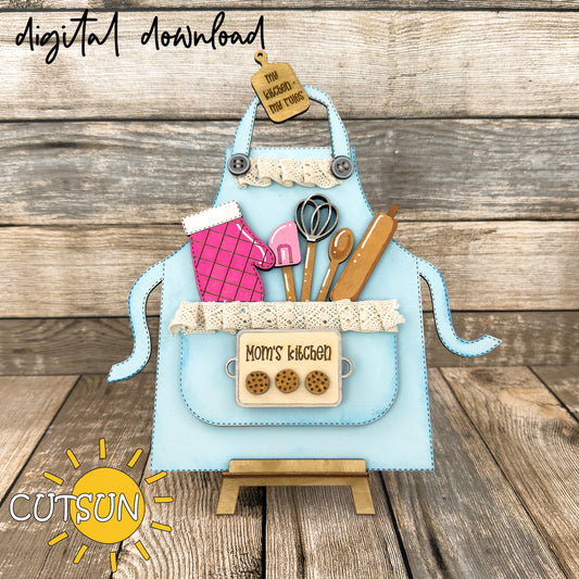 Laser cut file Mom’s Kitchen apron shelf sitter with cookie sheet, utensils, and mini cutting board