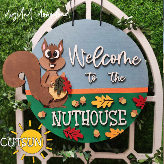 A digital door hanger featuring a squirrel with autumn leaves and the text 'Welcome to the NUTHOUSE'.