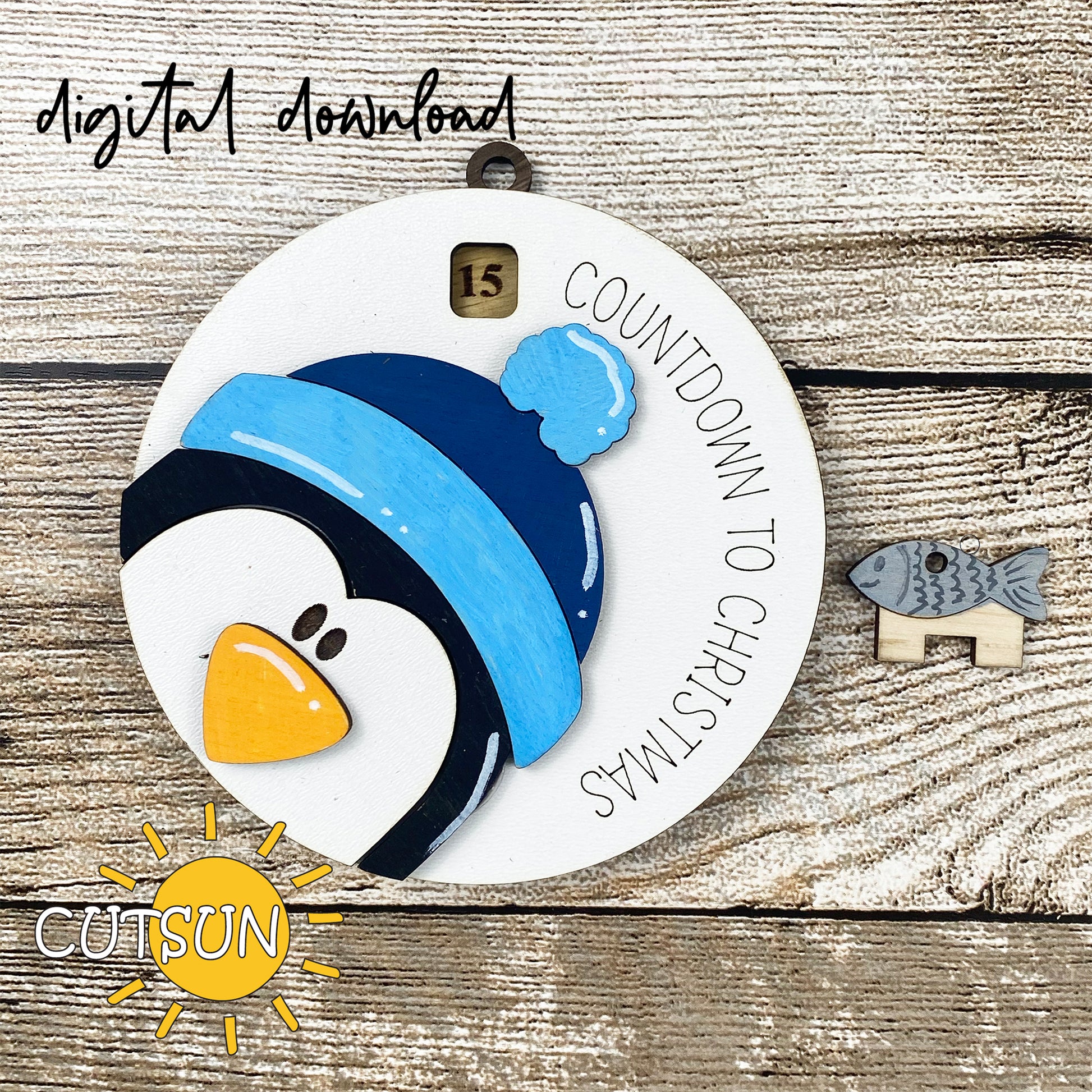 Digital download for a Christmas ornament countdown featuring a cute penguin with a pom pom hat.
