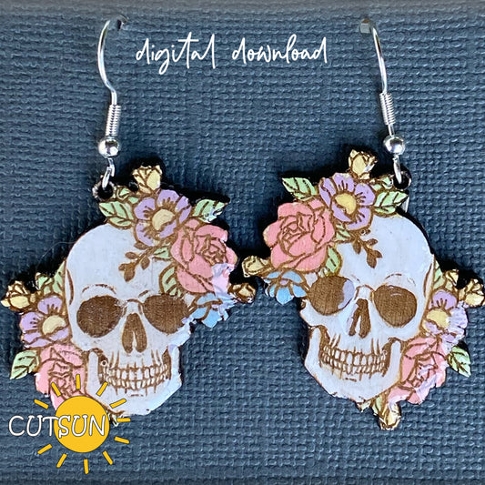 A pair of floral skull earrings with a digital download tag, crafted in a laser cut file format.