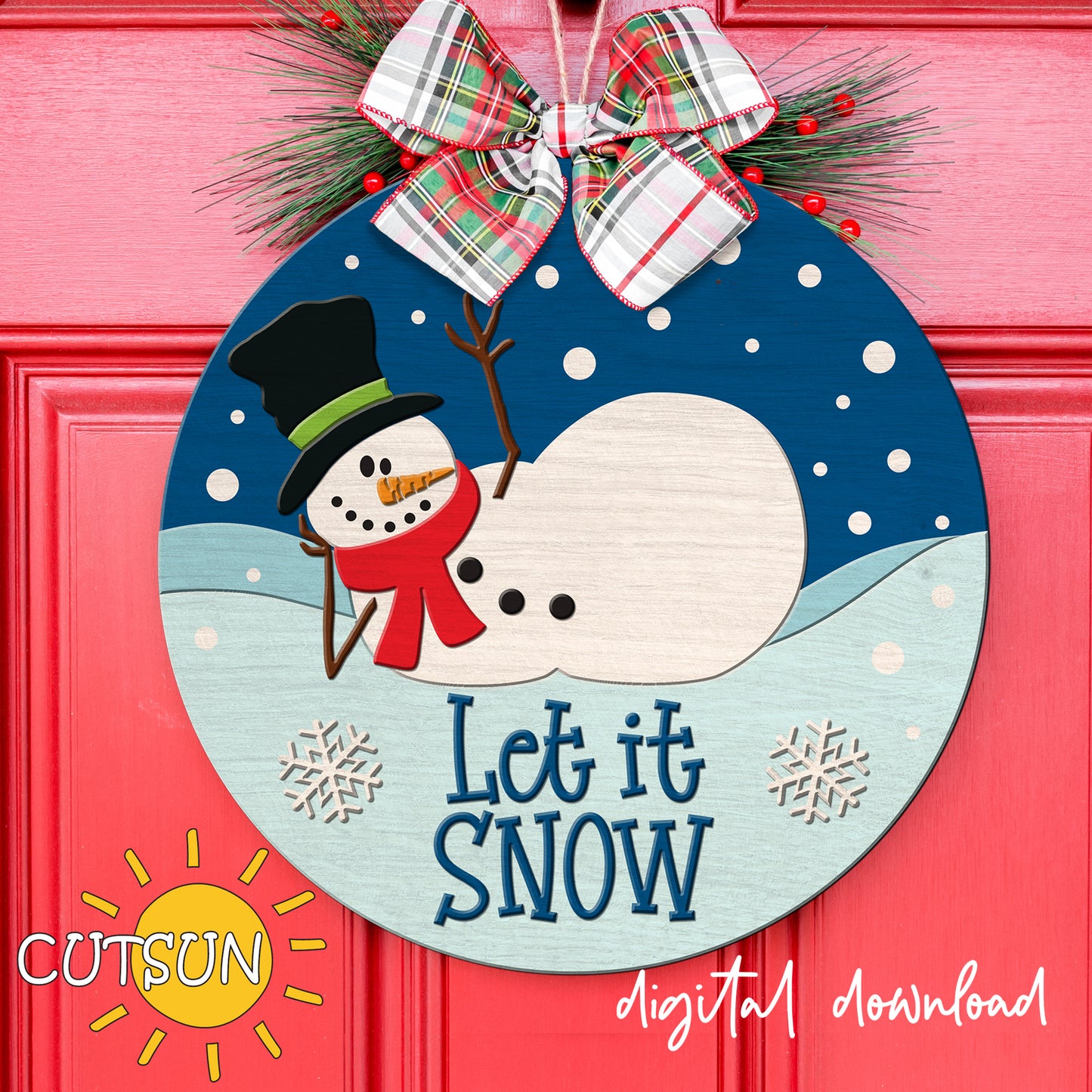 Digital download for a round winter door hanger featuring a relaxed snowman lying on the snow and the text 'Let it Snow'.