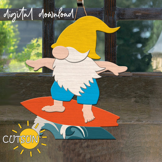 A digital download image of a surfing gnome door hanger, with the gnome depicted in a yellow hat and blue shorts, standing on a red and orange surfboard. The image shows the gnome against a window background, suggesting a summer theme.