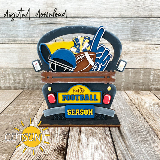 A digital download image featuring a football-themed decoration for a truck or wheelbarrow, with elements like a football, helmet, and pompoms, with the text 'Hello Football Season'.