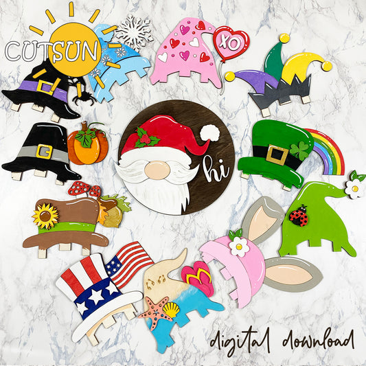A collection of colorful interchangeable round gnome door hangers in various designs, including hats with flowers, hearts, and stars, suitable for different seasons and holidays.