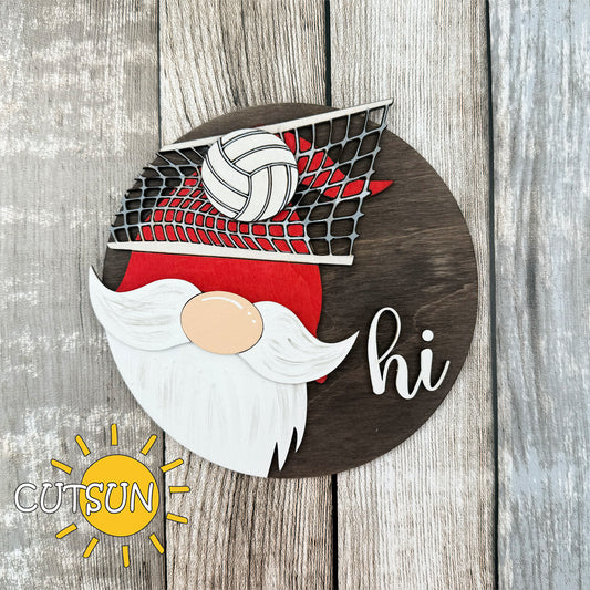 Laser cut file of a gnome holding a volleyball, designed as an interchangeable door hanger welcome sign.