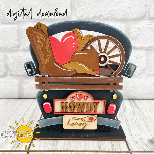 A digital illustration of a Valentine's Day-themed truck SVG add-on featuring a boot, hat, hearts, wheel, and the phrase 'Howdy honey'.