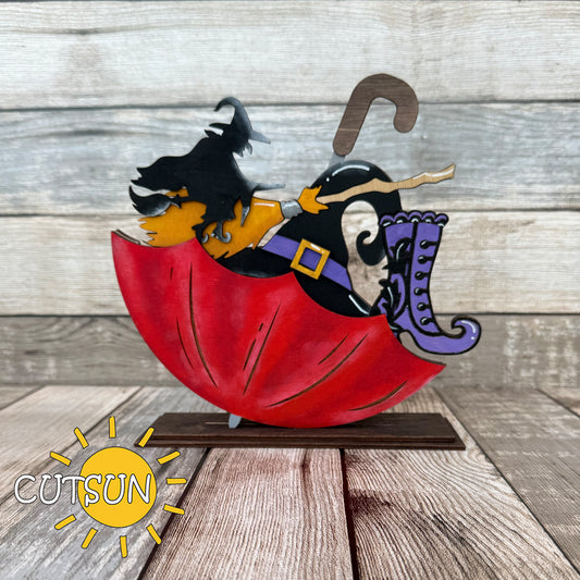 Witch-themed Halloween SVG add-on for upside down umbrella shelf sitter – includes hat, boots, and broom for laser cutting.
