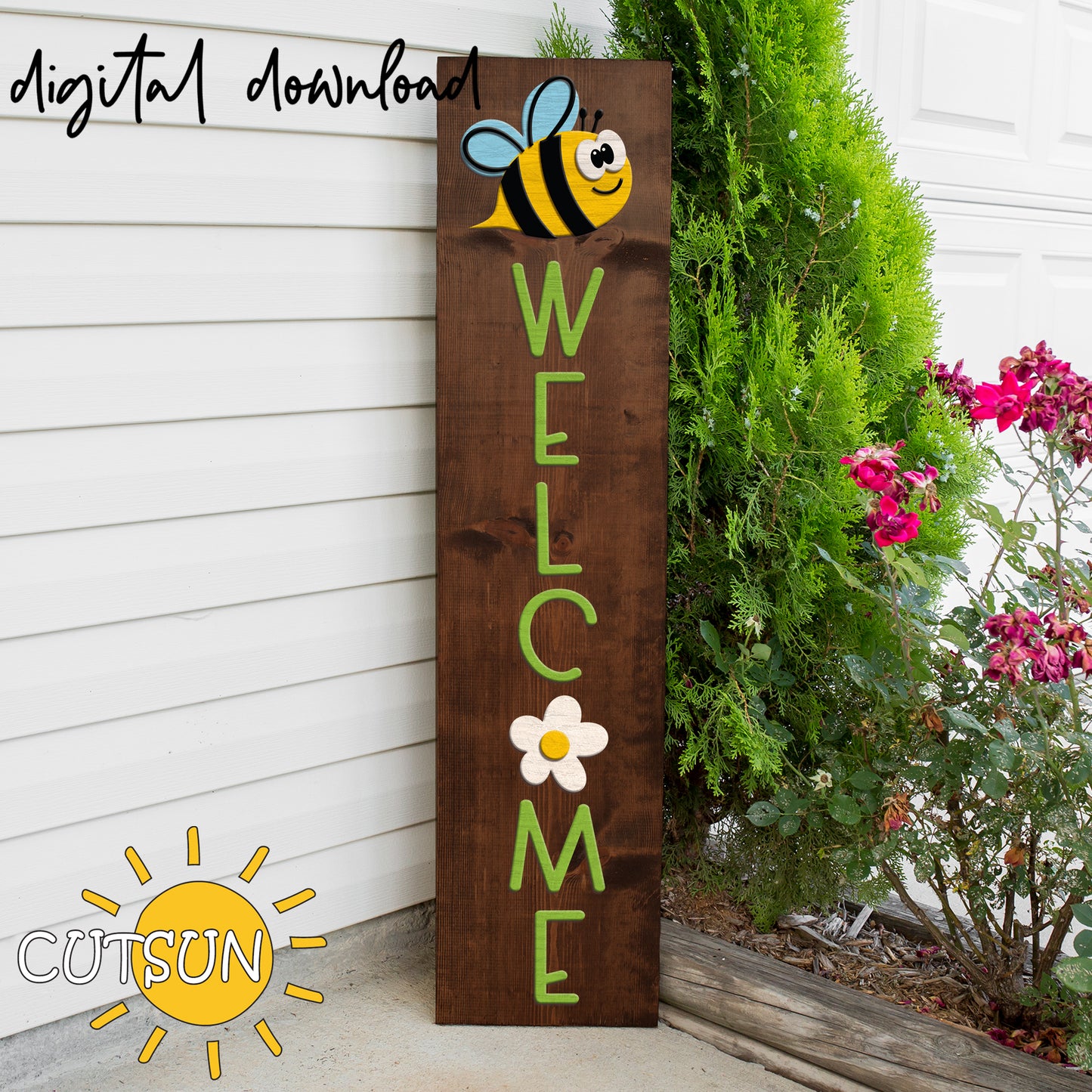 Wooden sign with a bee and 'Welcome' text, placed outdoors next to a house.