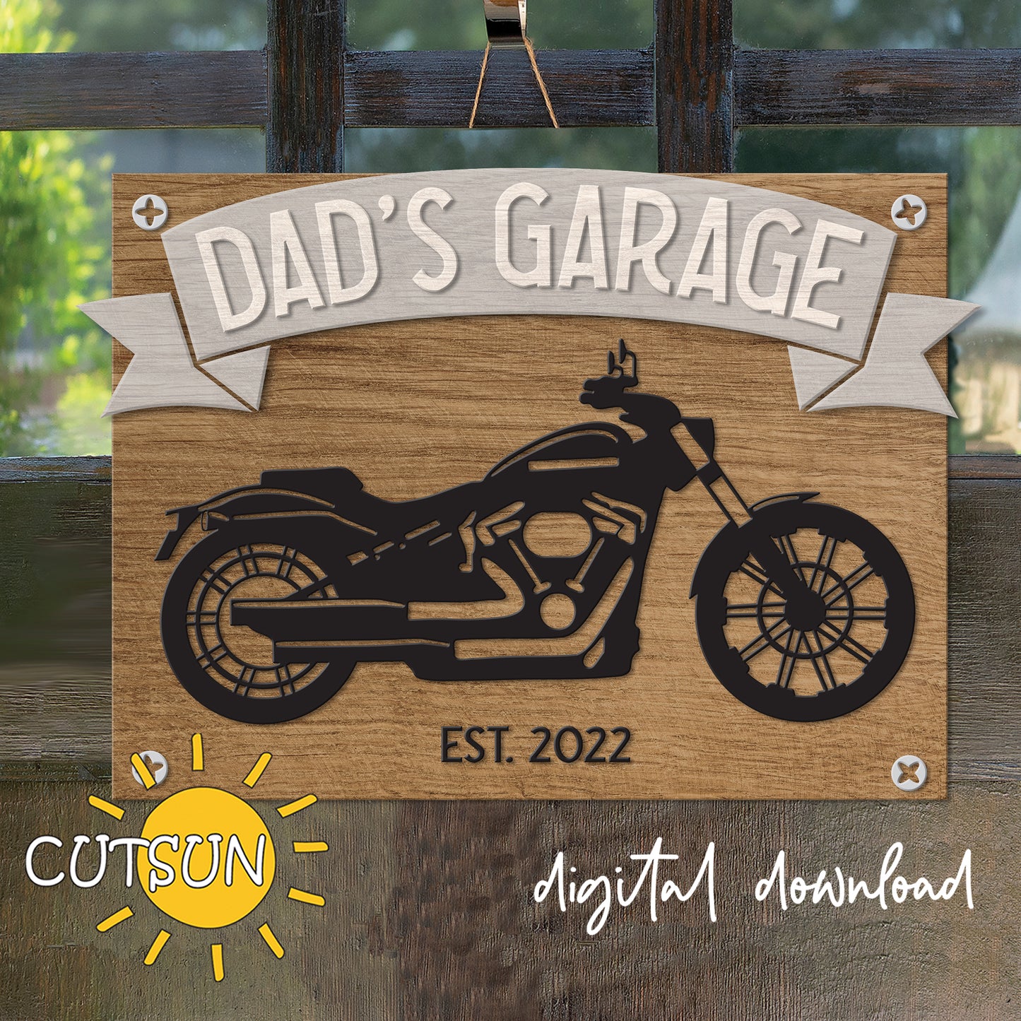 A digital download of a motorbike silhouette with a banner that reads 'DAD'S GARAGE EST. 2022' on a wooden background, indicating a custom sign for a garage.