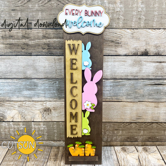 Easter porch sign SVG with three bunny silhouettes, carrots, and “Every Bunny Welcome” plaque – laser cut file with interchangeable vertical leaner base.