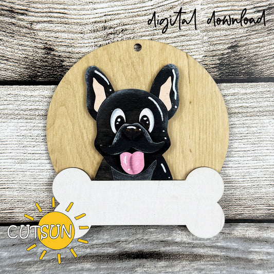 Layered French Bulldog Christmas ornament SVG with festive hat options and customizable bone nameplate for laser cutting.