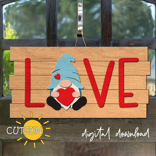 Wooden sign with a gnome holding a heart and the word 'LOVE' on a wooden background.