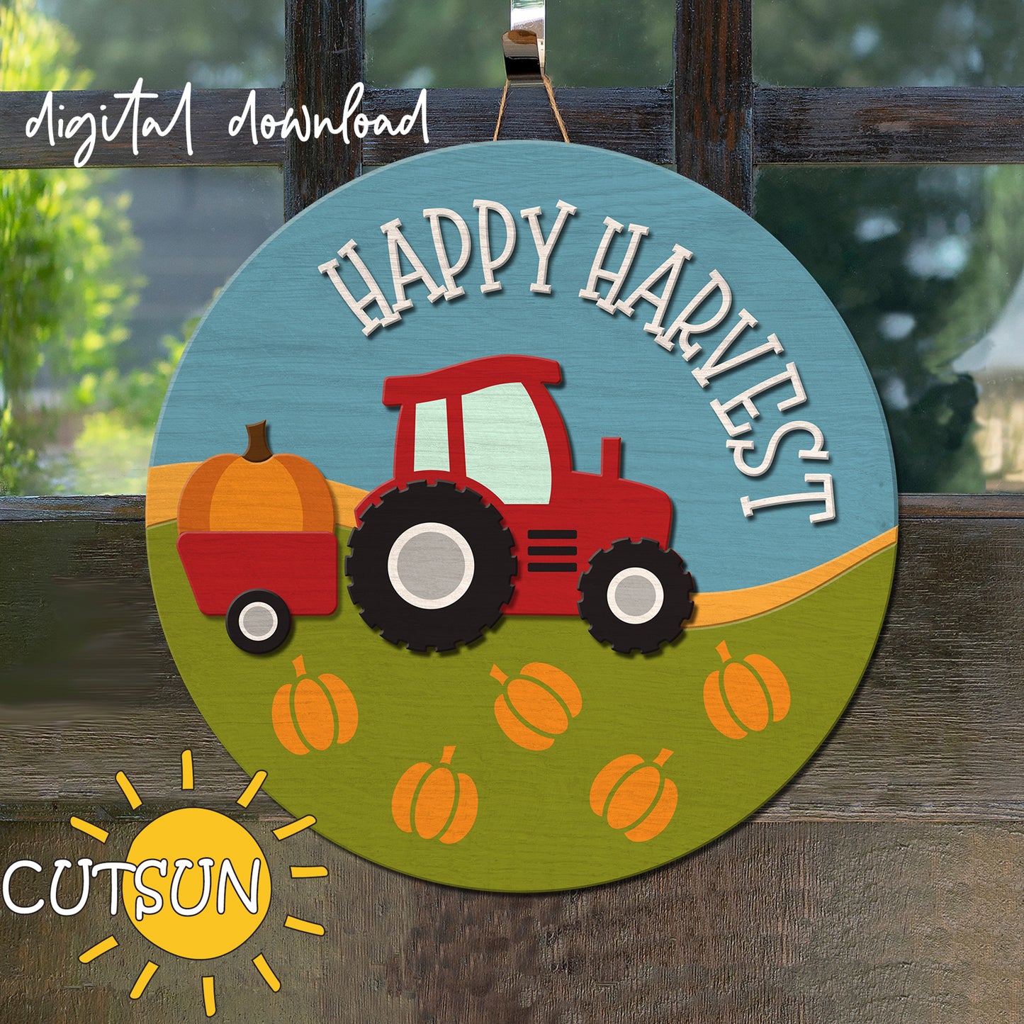 Digital download for a round door hanger featuring a tractor, pumpkins and the text 'Happy harvest'.