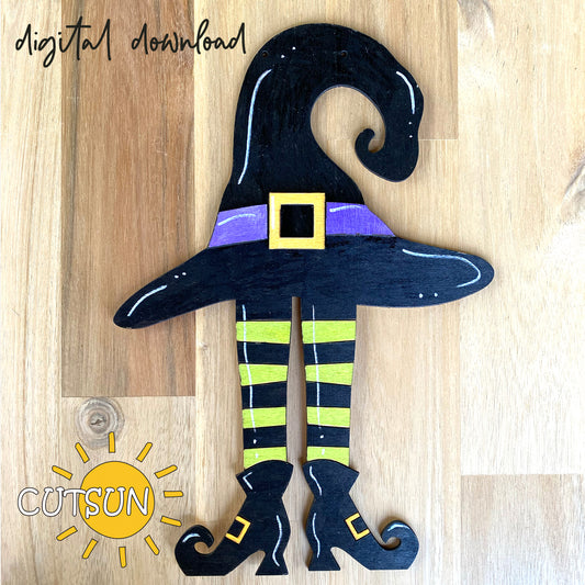 A digital download of a laser cut witch's hat and legs, predominantly black with a twisted hatband, yellow legs, and a purple belt, marked with 'Digital Download' and the Cutsun logo.