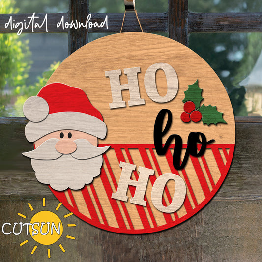 A digital download image of a round Christmas sign with 'Ho Ho Ho' text and a Santa Claus figure, decorated with holly and berries.
