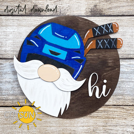 A digital illustration of a round gnome door hanger with a hockey theme. It features a gnome wearing a hockey helmet and holding hockey sticks.
