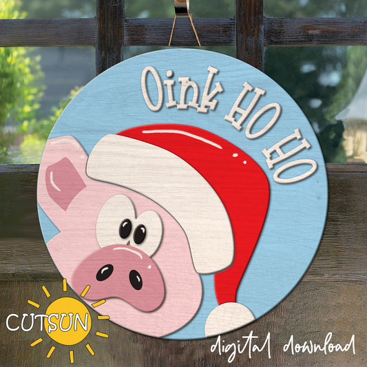 Circular sign with a pig wearing a Santa hat and 'Oink Ho Ho' text on a blue background, featuring the brand 'CUTSUN'.