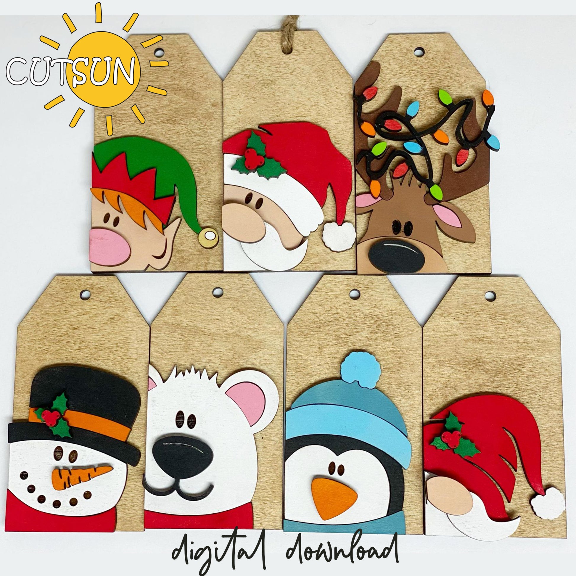 A set of digitally downloadable Christmas-themed gift tags with cute animal illustrations including a reindeer, polar bear, elf, and penguin, among others.