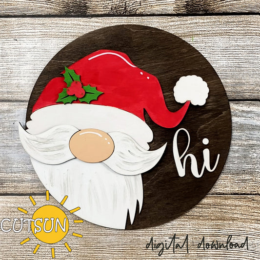 Round door hanger with a cut-out of a Santa Claus hat with holly berries, and the text 'HII' in the center, indicating a digital download for Christmas decor.