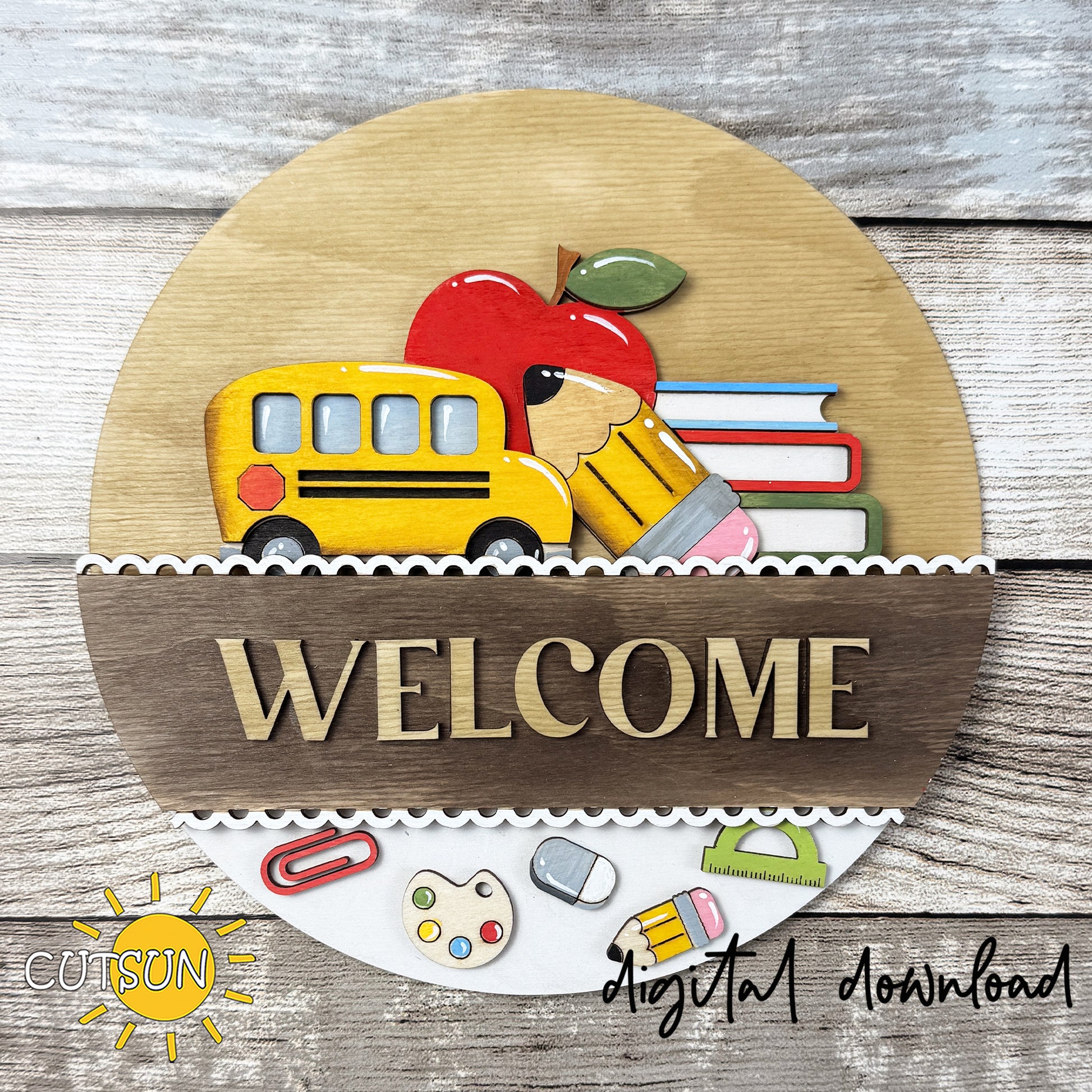 Interchangeable round sign back to school SVG insert featuring a school bus, books, apple, pencil, and layered classroom-themed details.