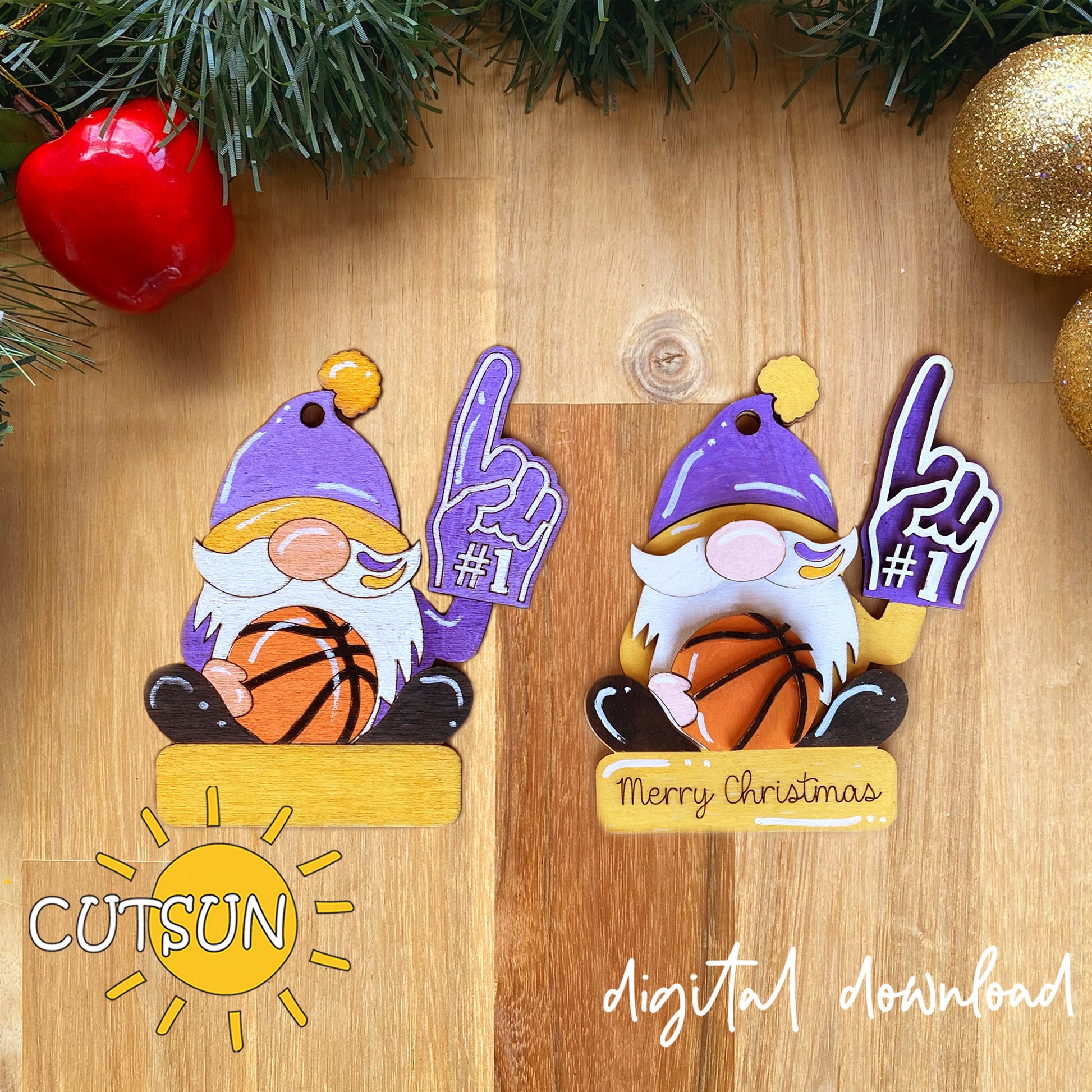 Two Christmas gnome ornaments with basketballs on a wooden surface with holiday decorations.
