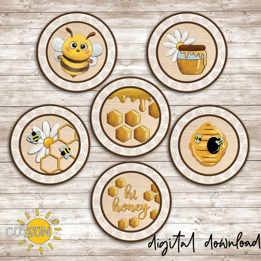 Six bee themed round interchangeable signs with honey jar, bees, honeycomb, beehive, and floral designs