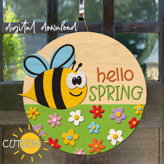 Decorative sign with a bee and 'hello SPRING' text on a wooden background
