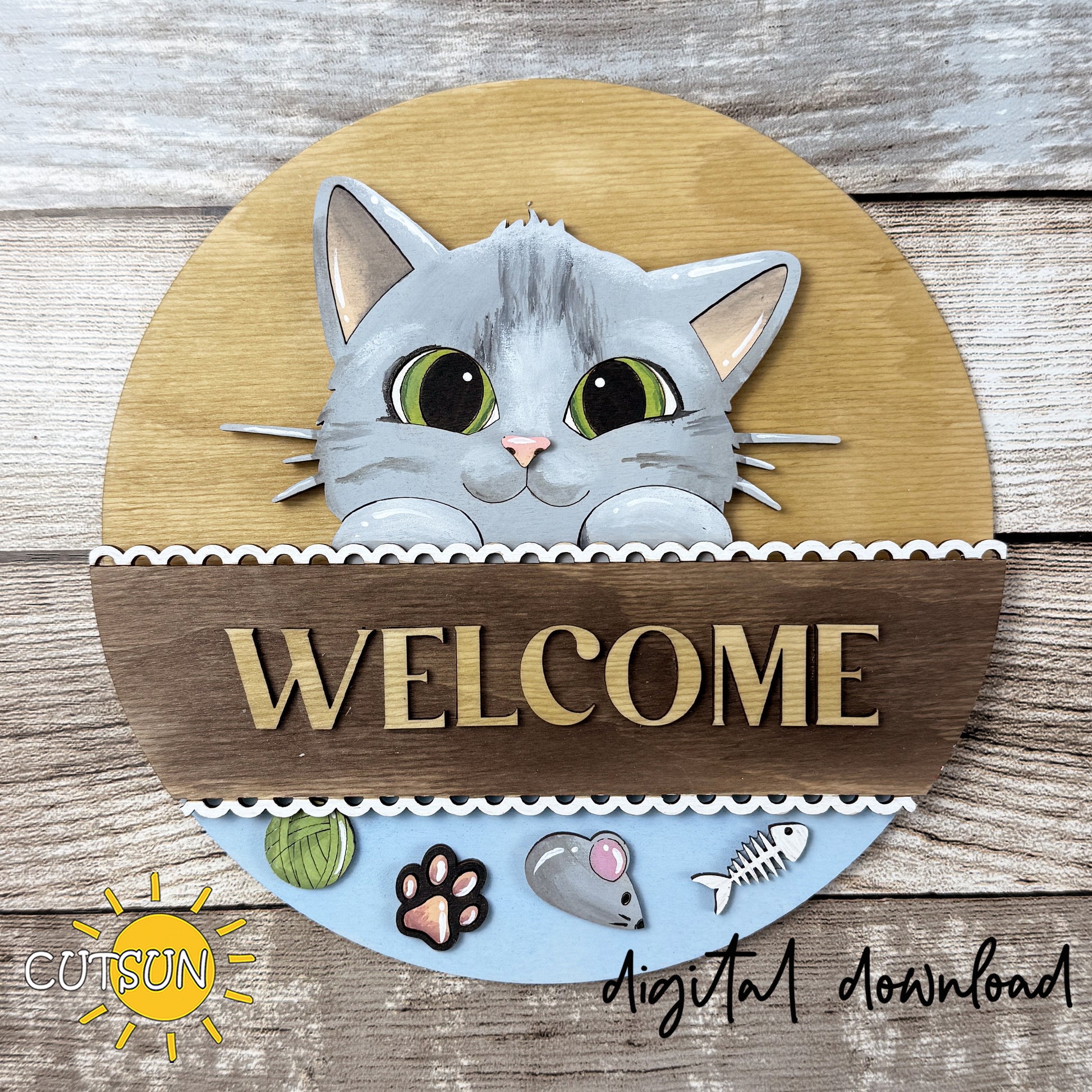 Interchangeable round sign cat SVG insert featuring a peeking gray cat with green eyes, layered farmhouse details, paw print accents, yarn ball, mouse, and fish bone decorations.