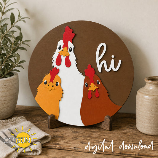 Layered wooden round door sign featuring three hand-painted chickens and a white “hi” greeting on a warm brown background.