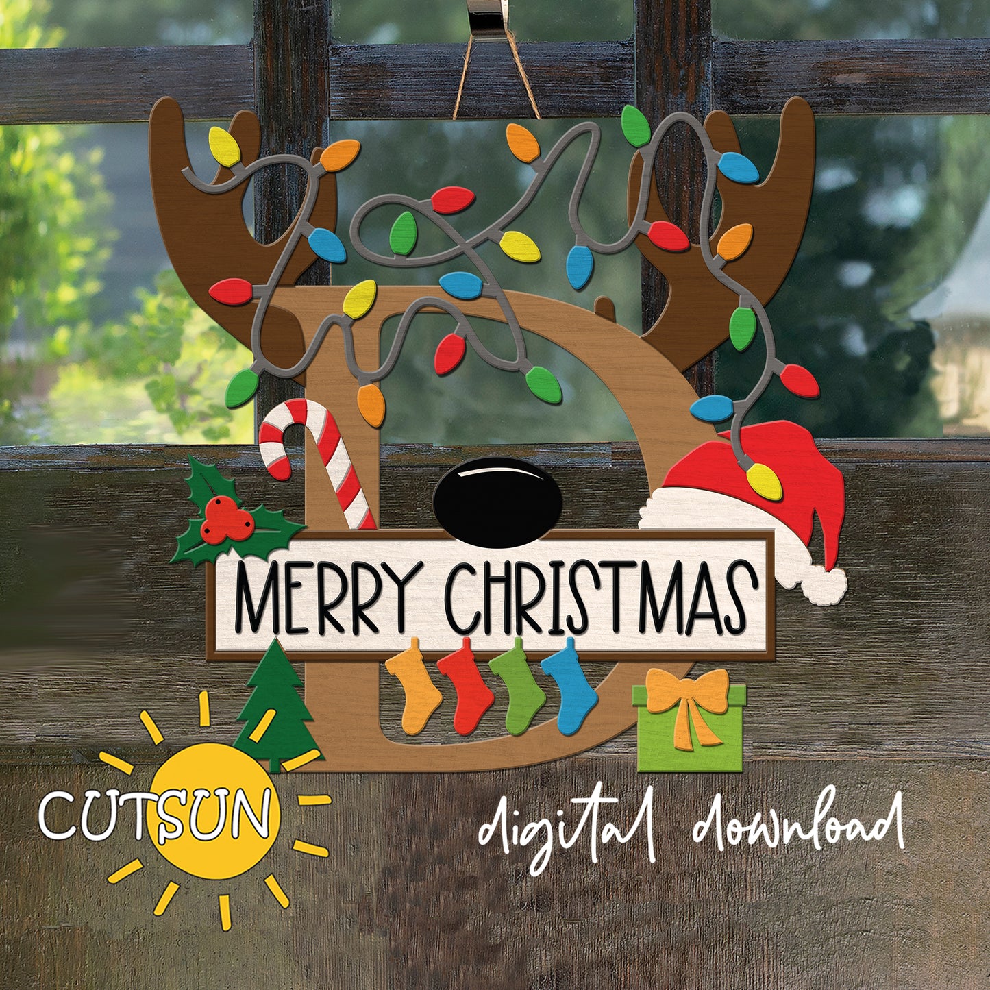 Laser cut Christmas door sign - monogram letter D with antlers, Christmas lights, candy cane, holly berry, a Christmas tree, a present, Santa hat and four stockings.