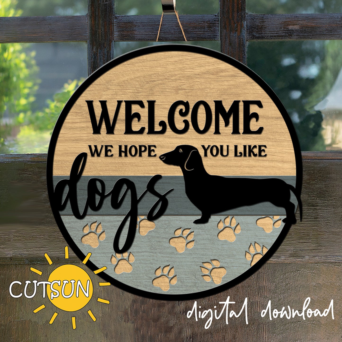Wooden sign with 'Welcome, we hope you like dogs' text and a dachshund silhouette, featuring paw prints on a wooden background.