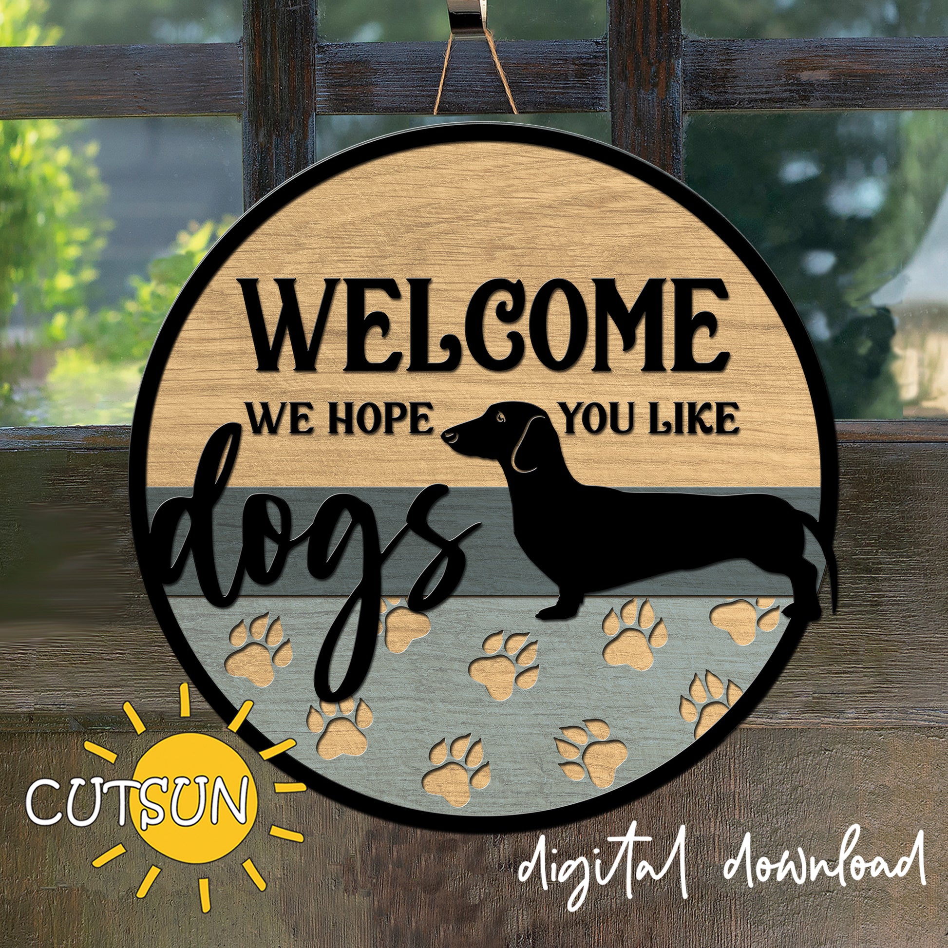 Wooden sign with 'Welcome, we hope you like dogs' text and a dachshund silhouette, featuring paw prints on a wooden background.