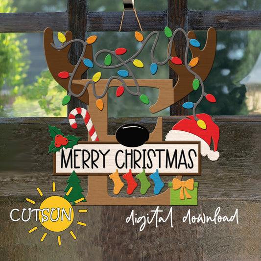 Laser cut Christmas door sign - monogram letter E with antlers, Christmas lights, candy cane, holly berry, a Christmas tree, a present, Santa hat and four stockings.