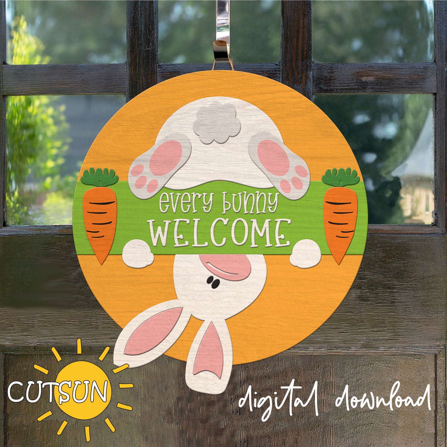 Decorative door hanger with bunny design and 'Every Bunny Welcome' text on a wooden background.