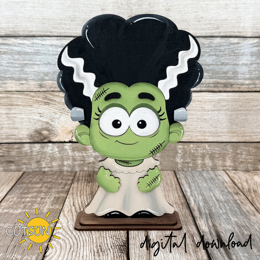 Layered Frankenstein Bride shelf sitter laser cut file with interchangeable heart, candy corn, and wrapped candy accessories for Halloween decor.
